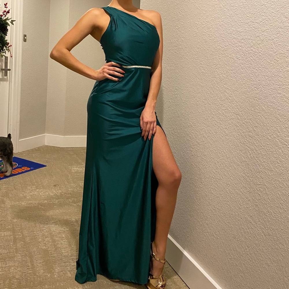 One shoulder green evening gown